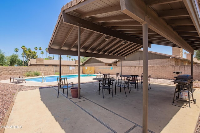 2015 E Southern Ave Unit 16, Tempe, AZ 85282 - view of swimming pool featuring area for grilling, a fenced backyard, and a patio