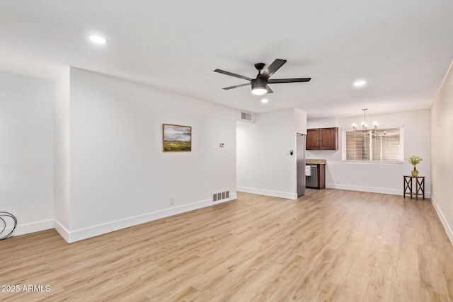 2015 E Southern Ave Unit 16, Tempe, AZ 85282 - unfurnished living room with a chandelier, light wood finished floors, recessed lighting, and ceiling fan