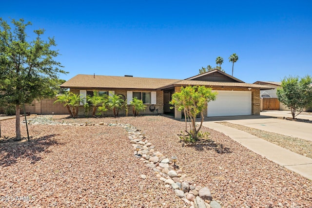 3747 W Aire Libre Ave, Phoenix, AZ 85053 - ranch-style home with driveway, a garage, and brick siding