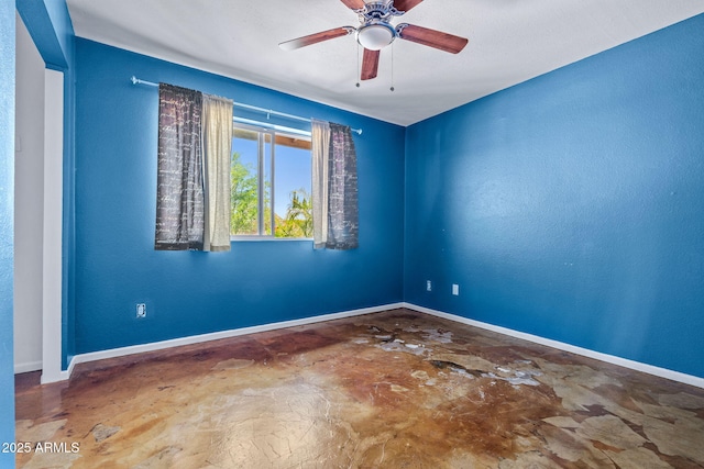 3747 W Aire Libre Ave, Phoenix, AZ 85053 - unfurnished room featuring baseboards, a ceiling fan, and concrete floors