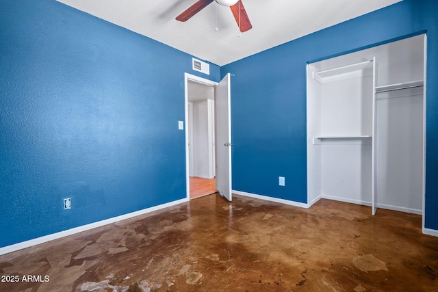 3747 W Aire Libre Ave, Phoenix, AZ 85053 - unfurnished bedroom with finished concrete flooring, baseboards, a closet, and a ceiling fan