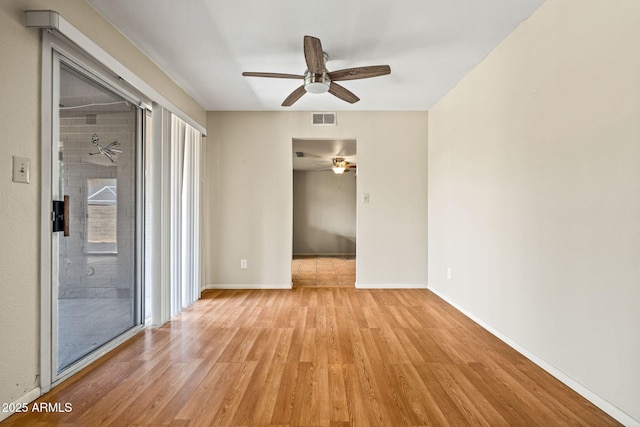 3747 W Aire Libre Ave, Phoenix, AZ 85053 - unfurnished room featuring a ceiling fan, light wood-type flooring, and baseboards
