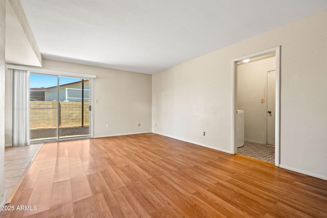 3747 W Aire Libre Ave, Phoenix, AZ 85053 - empty room featuring light wood-type flooring and baseboards