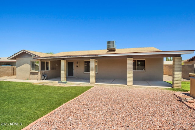3747 W Aire Libre Ave, Phoenix, AZ 85053 - back of property with a patio area, brick siding, and central AC
