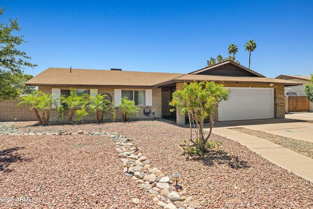 3747 W Aire Libre Ave, Phoenix, AZ 85053 - ranch-style house with concrete driveway, a garage, and brick siding