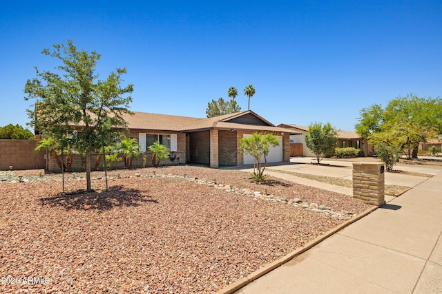 3747 W Aire Libre Ave, Phoenix, AZ 85053 - single story home featuring concrete driveway, an attached garage, and brick siding