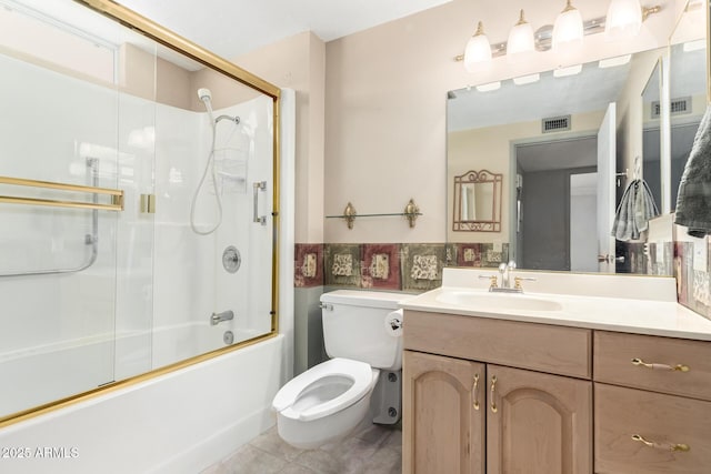 full bathroom featuring tile patterned floors, vanity, visible vents, and tile walls