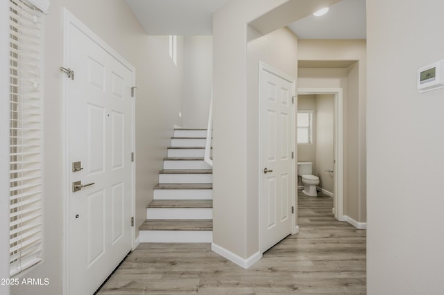 41715 N Raleigh Ct, Anthem, AZ 85086 - stairs with wood finished floors and baseboards