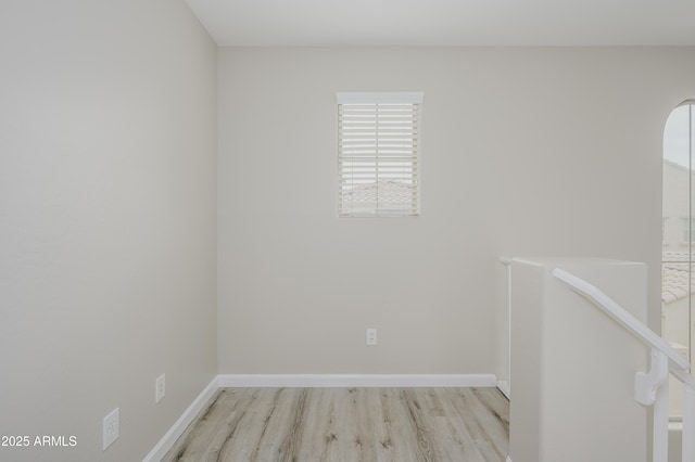 41715 N Raleigh Ct, Anthem, AZ 85086 - spare room with wood finished floors and baseboards