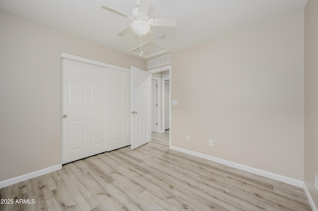 41715 N Raleigh Ct, Anthem, AZ 85086 - unfurnished bedroom featuring wood finished floors, baseboards, and a closet