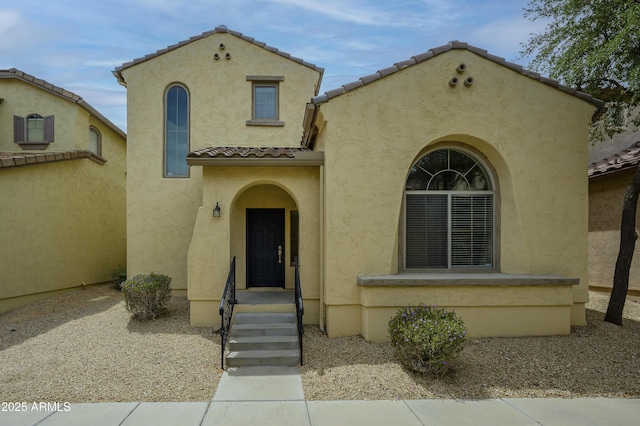 41715 N Raleigh Ct, Anthem, AZ 85086 - mediterranean / spanish-style home with a tile roof and stucco siding