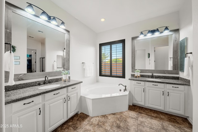 20546 W Summit Pl, Buckeye, AZ 85396 - full bath featuring two vanities and a garden tub