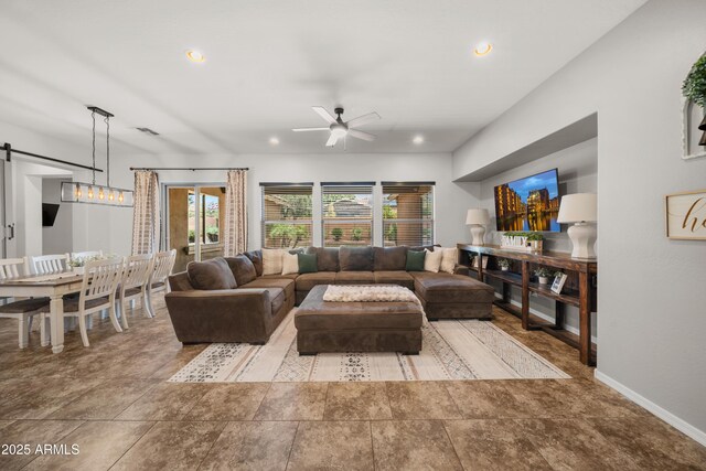 20546 W Summit Pl, Buckeye, AZ 85396 - living room with ceiling fan, recessed lighting, and baseboards