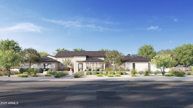 view of front of house featuring stucco siding