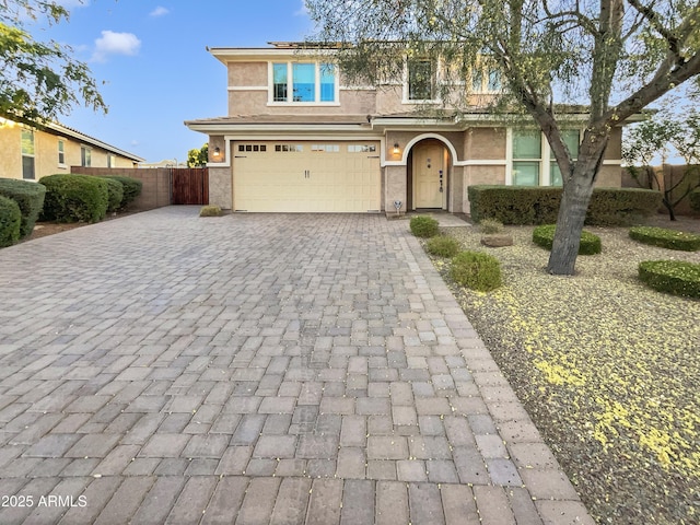 view of front of property with a garage