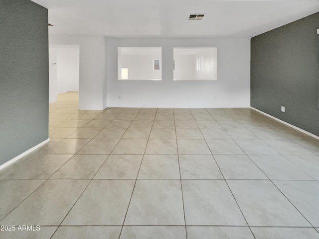 view of tiled spare room