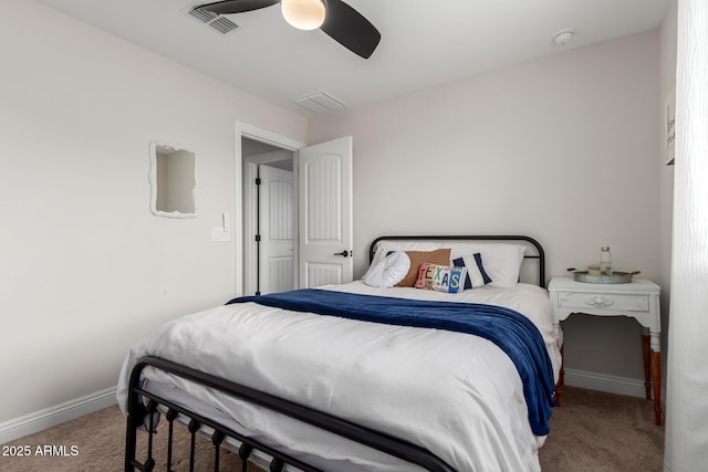 bedroom featuring ceiling fan, carpet, visible vents, and baseboards