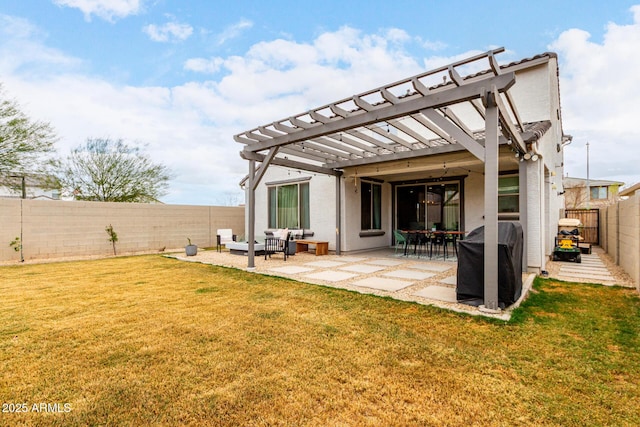 rear view of house with a yard, an outdoor hangout area, a patio area, a pergola, and a fenced backyard