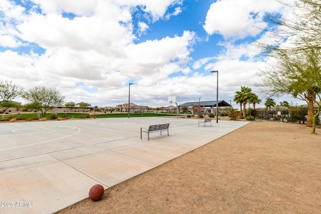 view of community featuring community basketball court