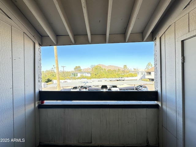 balcony featuring a mountain view