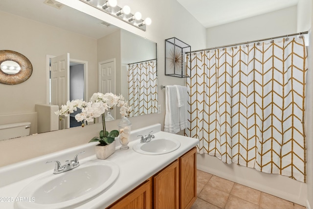 full bathroom with vanity, tile patterned floors, shower / bath combination with curtain, and toilet