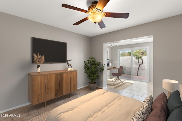 bedroom with access to exterior, a ceiling fan, baseboards, and light tile patterned floors