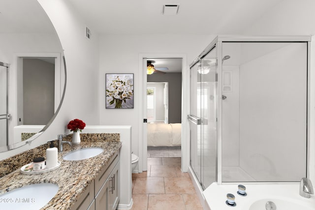 full bathroom featuring visible vents, toilet, a stall shower, connected bathroom, and a sink