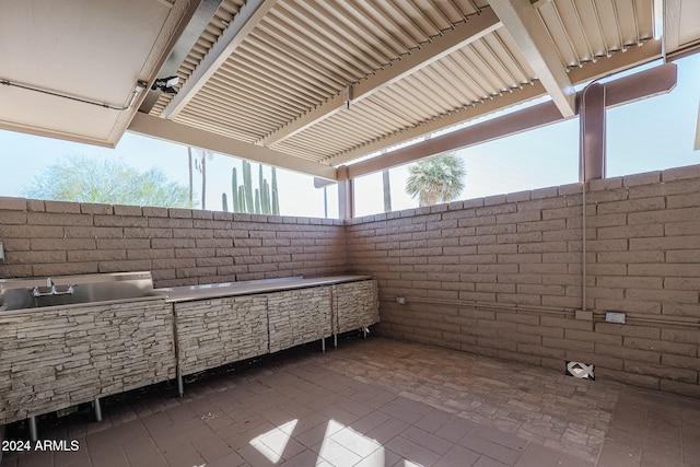 view of home's community with a patio area