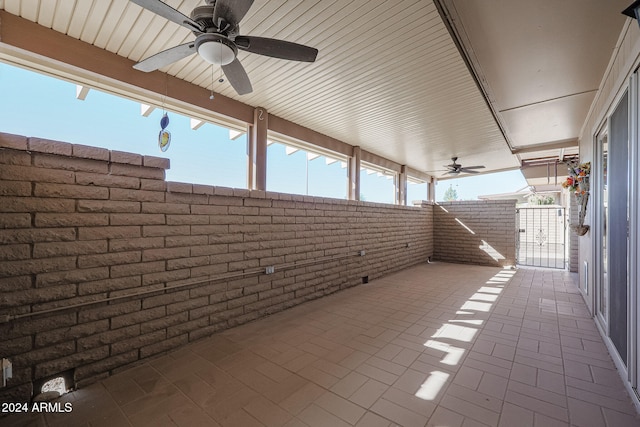 view of patio featuring ceiling fan