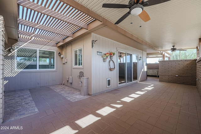 view of patio / terrace with a pergola and ceiling fan