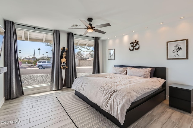 bedroom featuring access to outside and ceiling fan