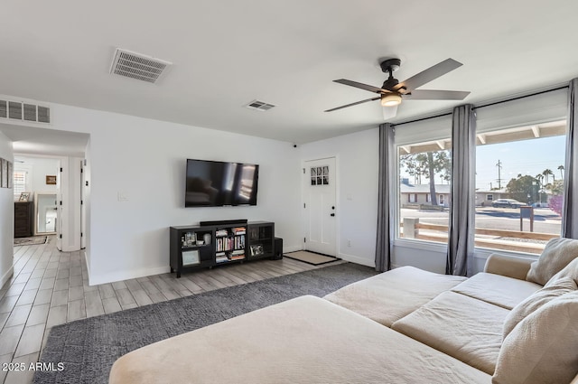 bedroom with ceiling fan and hardwood / wood-style floors