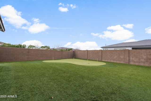 view of yard featuring a fenced backyard