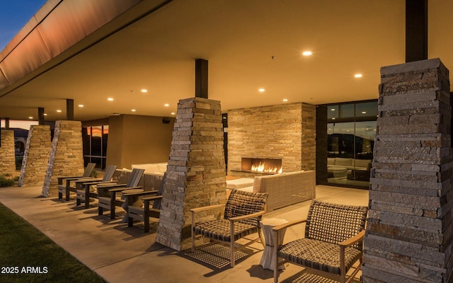 10322 E Topaz Ave, Mesa, AZ 85212 - view of patio / terrace featuring an outdoor stone fireplace