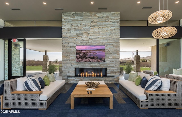 10322 E Topaz Ave, Mesa, AZ 85212 - living room featuring plenty of natural light, an outdoor stone fireplace, and recessed lighting