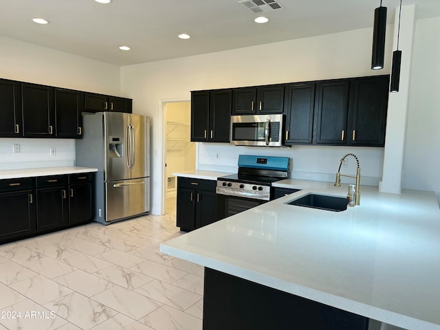 kitchen featuring stainless steel appliances and sink