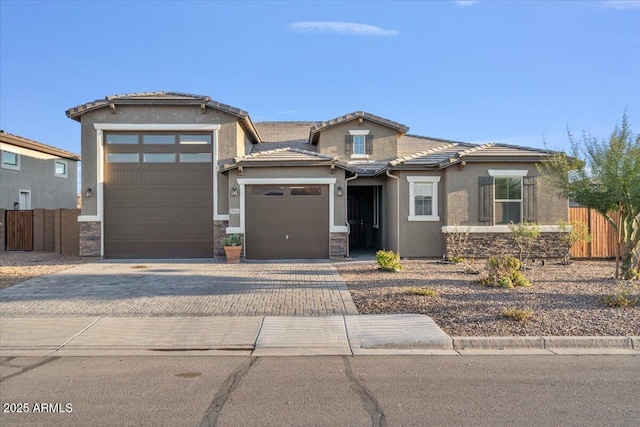 prairie-style house featuring a garage