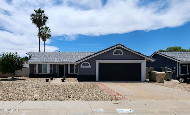 ranch-style home with a garage