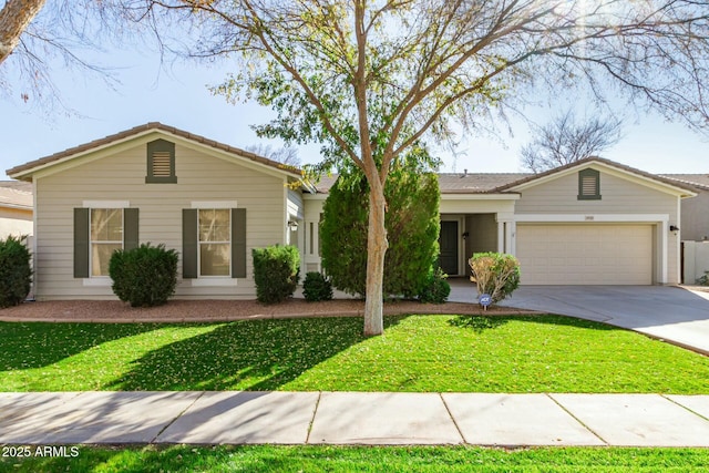 ranch-style house featuring a garage and a front yard