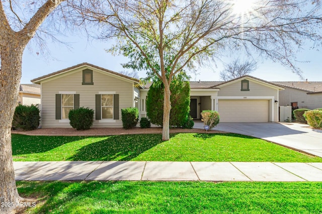 ranch-style house featuring a garage and a front lawn