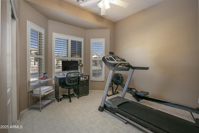 exercise room featuring ceiling fan