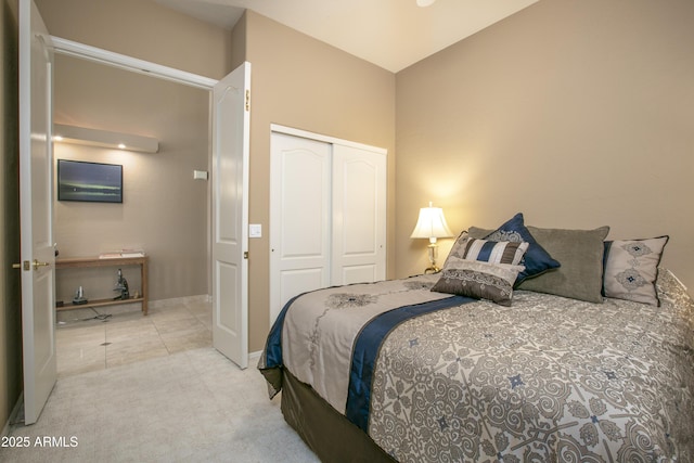 carpeted bedroom with a closet