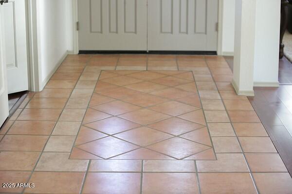 view of tiled foyer entrance