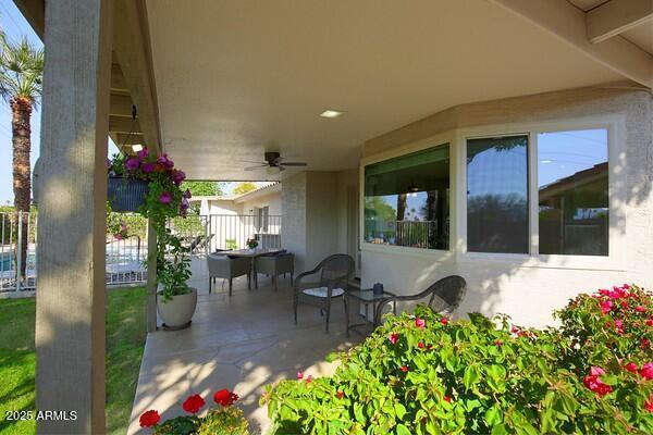 view of patio / terrace featuring ceiling fan