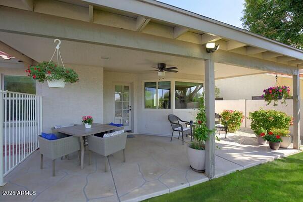 view of patio / terrace with ceiling fan