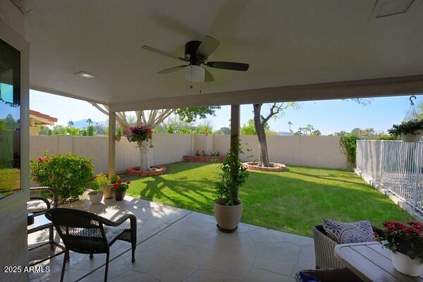 view of patio with ceiling fan