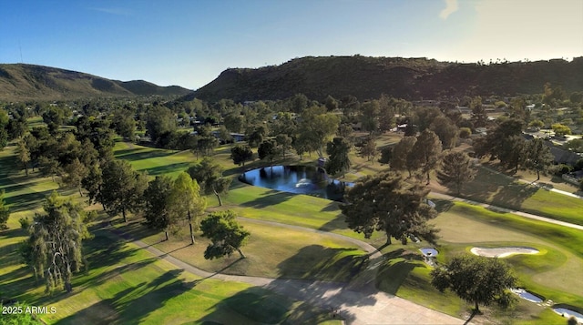 aerial view featuring a water and mountain view