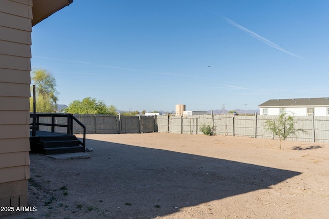 view of yard featuring a fenced backyard