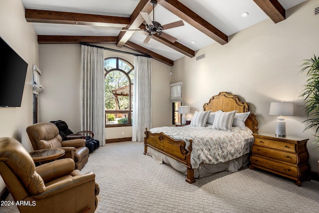 carpeted bedroom with ceiling fan and lofted ceiling with beams