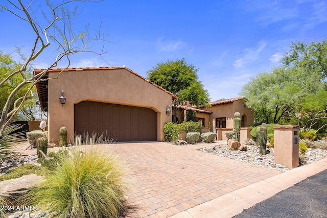 view of front of home with a garage